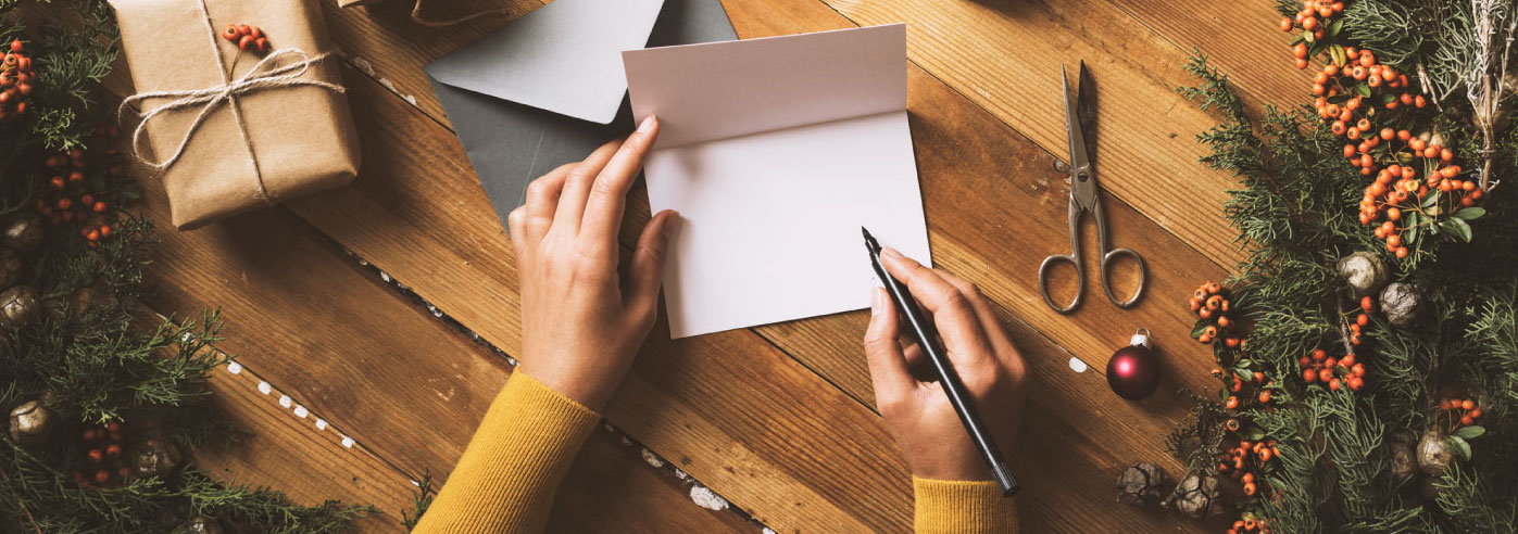 52 Christmas Card Sayings & Wishes Even Scrooge Can’t Resist