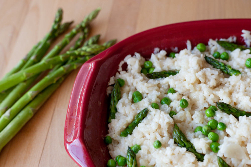 perfect potluck baked risotto with asparagus and peas