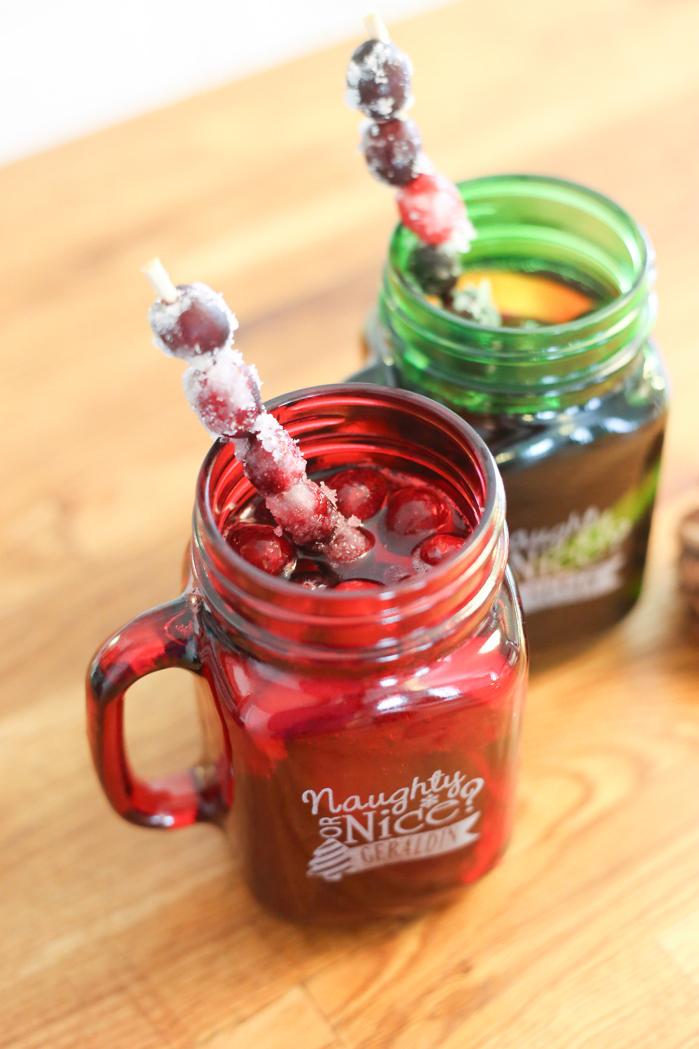 homemade holiday punch in mason jar glasses