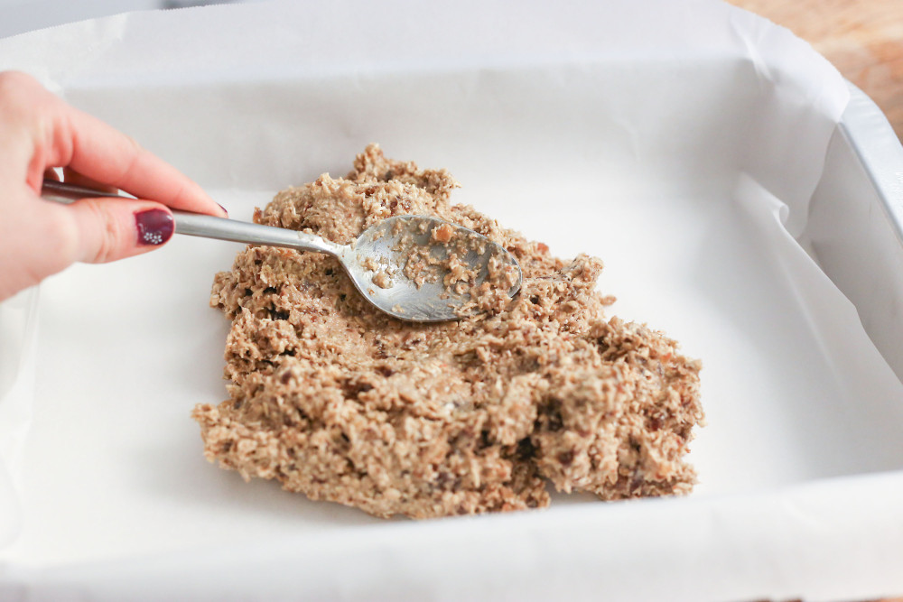 spreading oatmeal mix