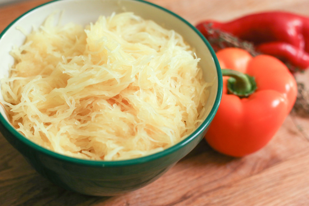 spaghetti in a bowl and peppers