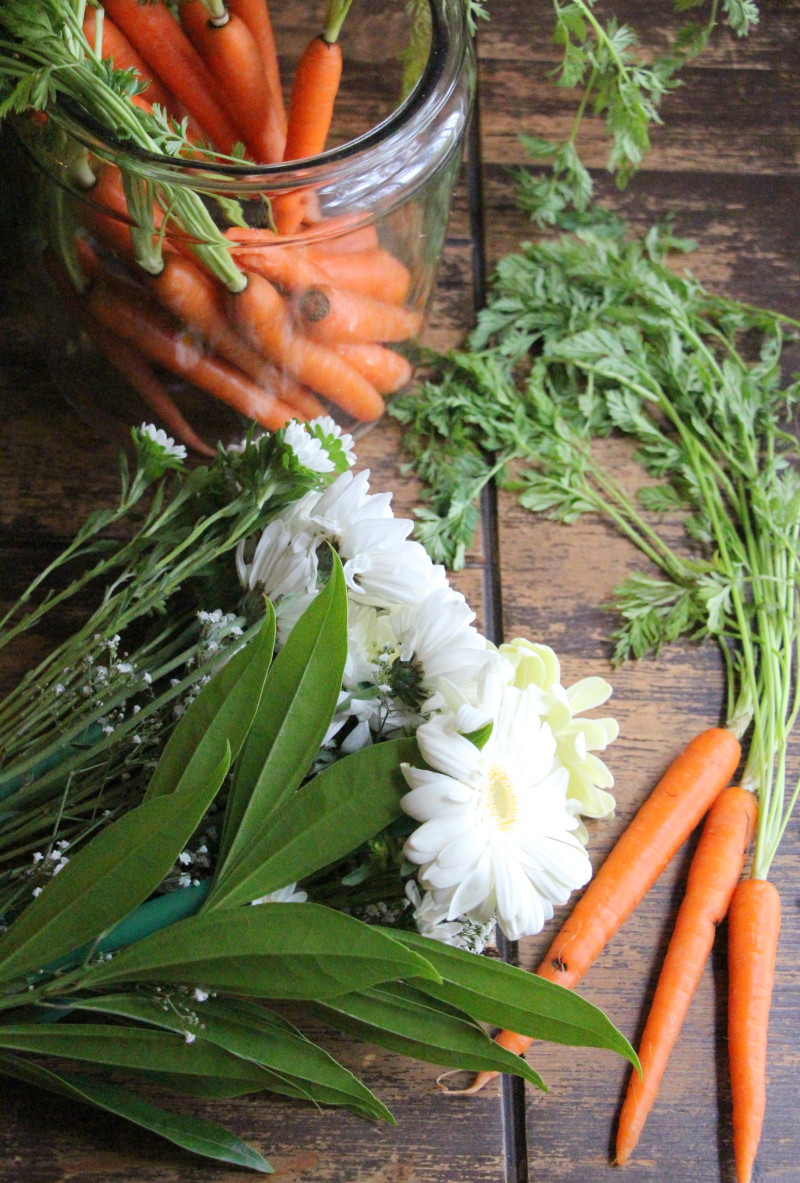 DIY Easter centerpiece daisies and fresh carrots