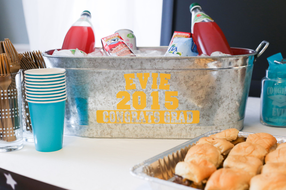 steel beverage tub with drinks and cups