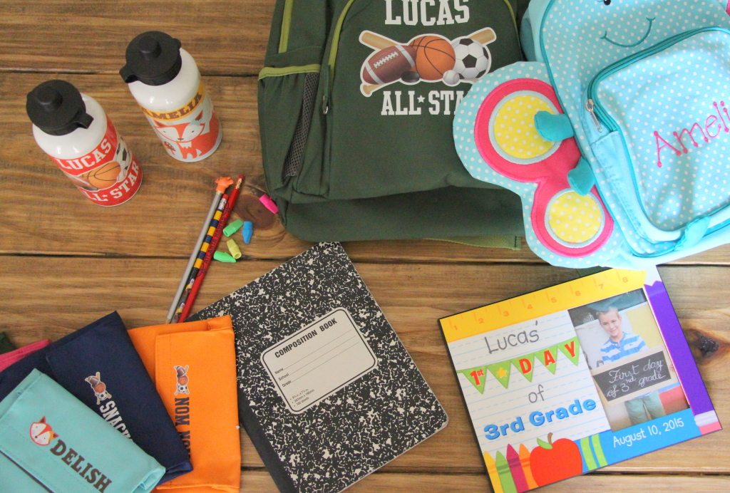 back to school snacks water bottle notebook backpack