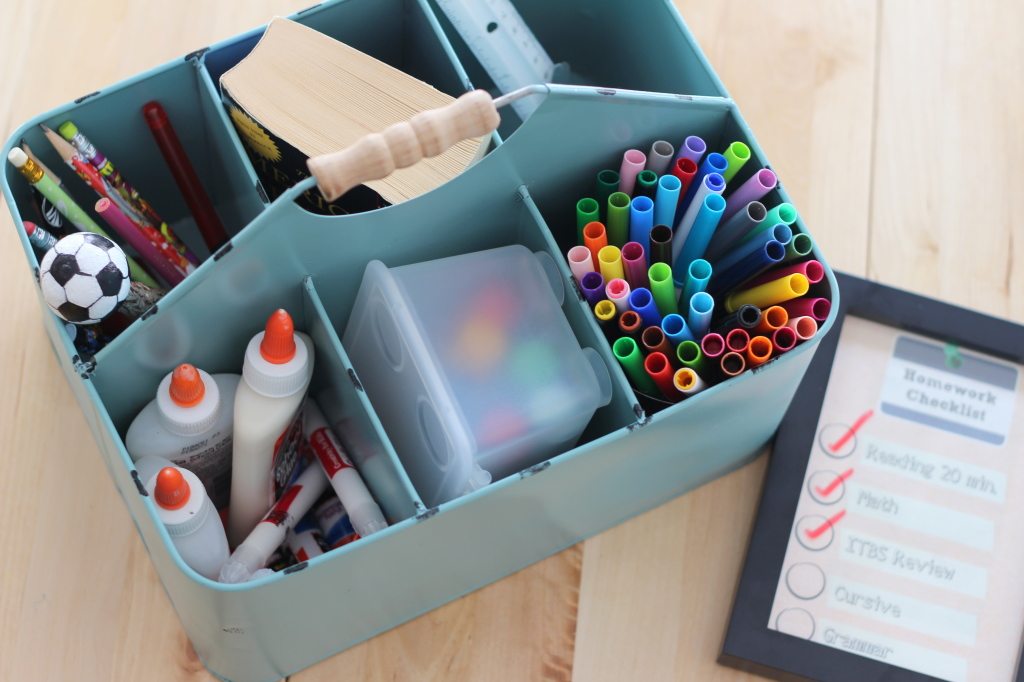 tote organizer with glue pens pencils chalk and checklist