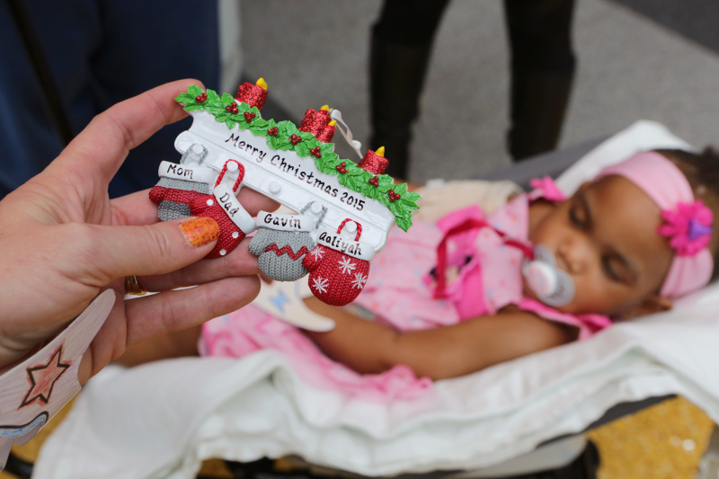 A Personal Creations ornament was hand-painted for Aaliyah Eggleston and her family. Photo by Jean Marc Giboux/AP Images for Personal Creations.