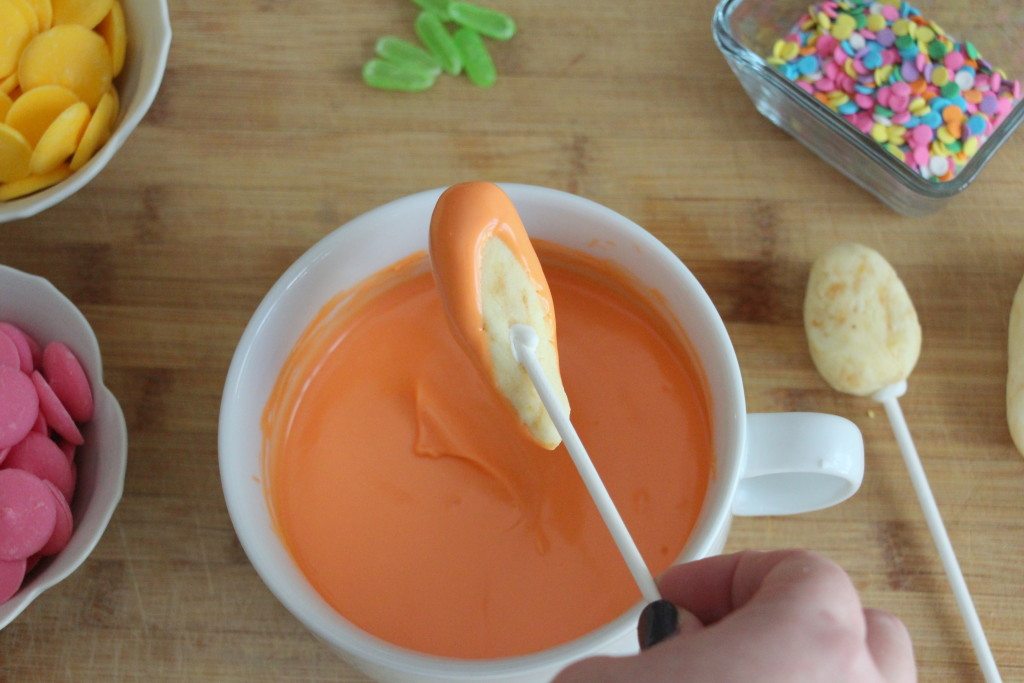 dipping a carrot cake pop