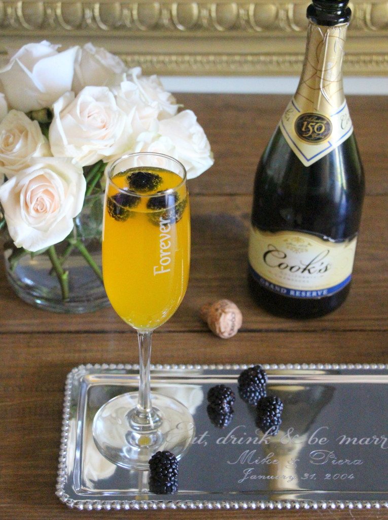 blackberries in a mimosa chapagne flute