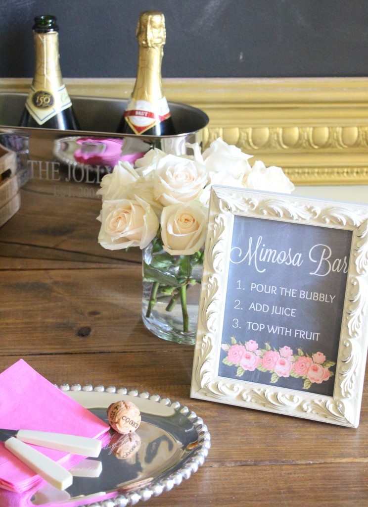 mimosa bar sign and roses