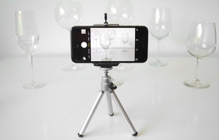 An iPhone on a tripod to stabilize the shot