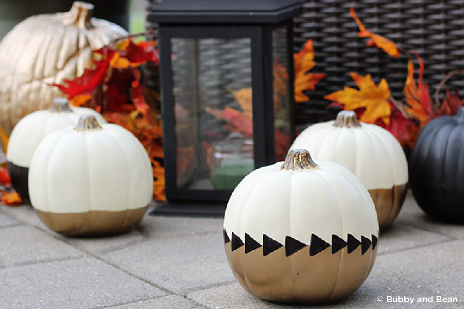 pumpkin painted with arrows on it