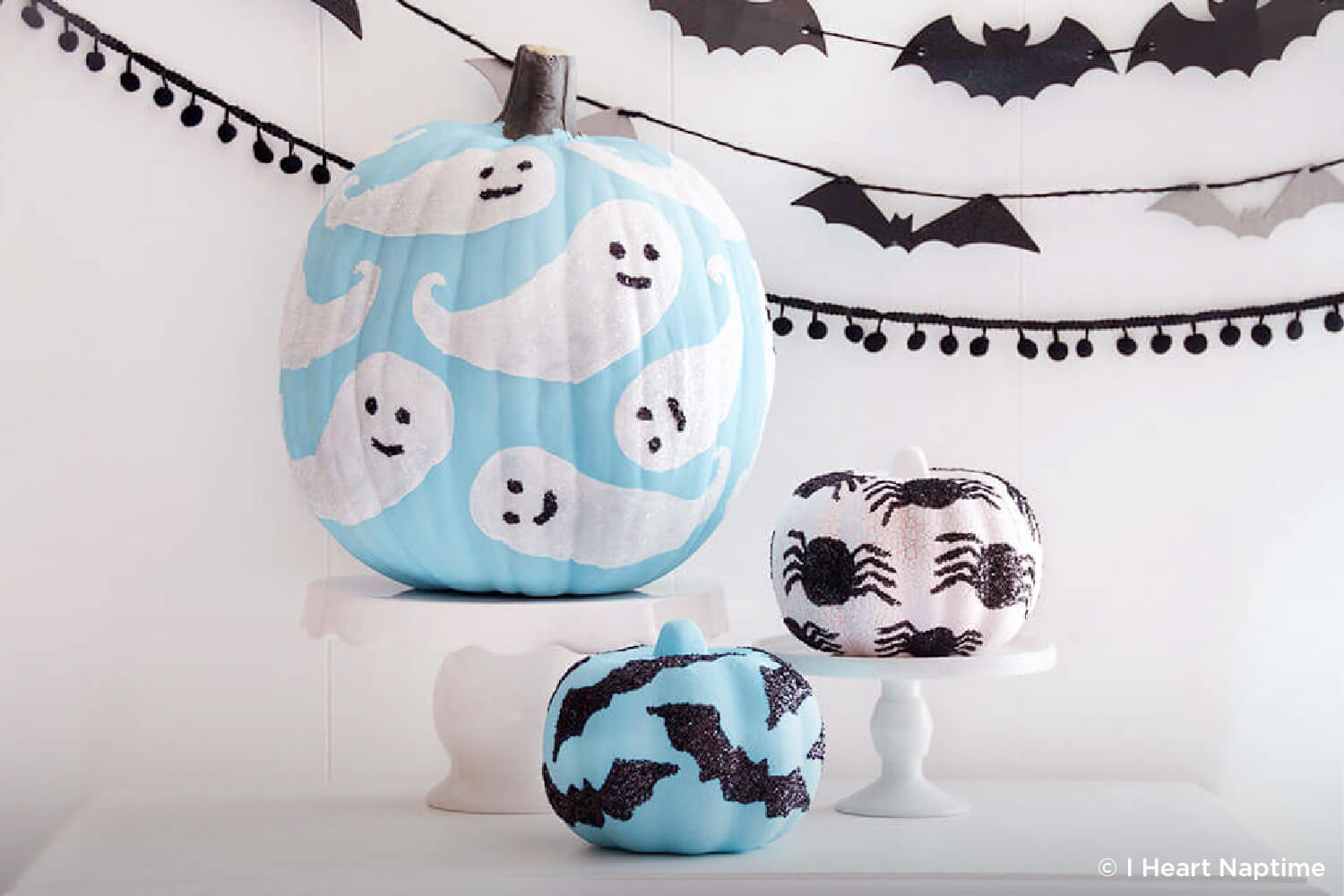 pumpkin decorated with glittery ghosts