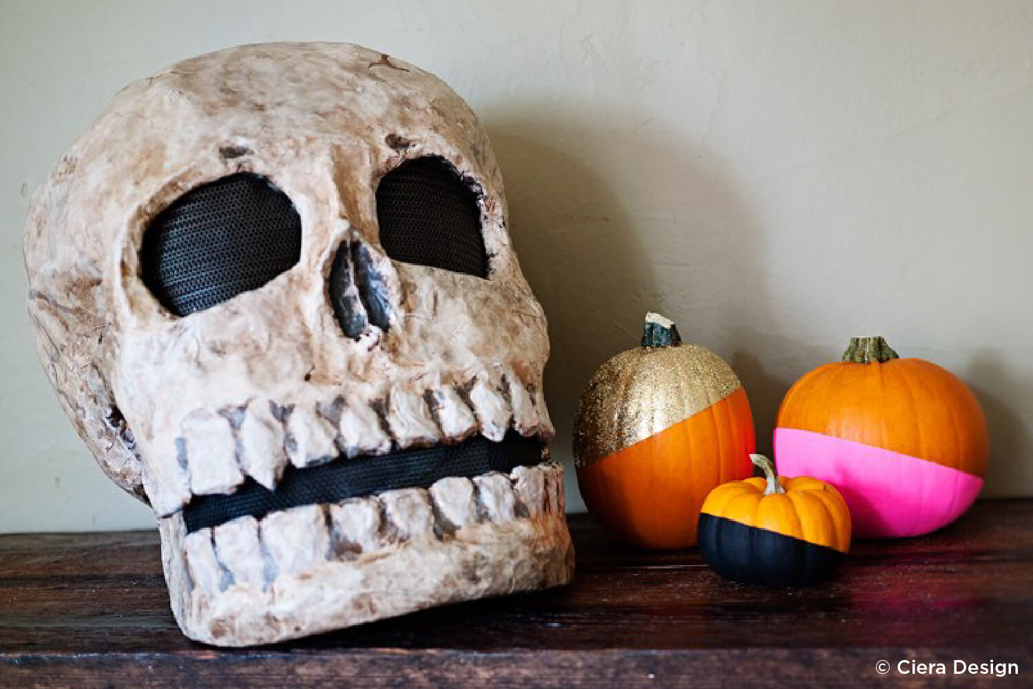 pumpkins dipped in colorful paint