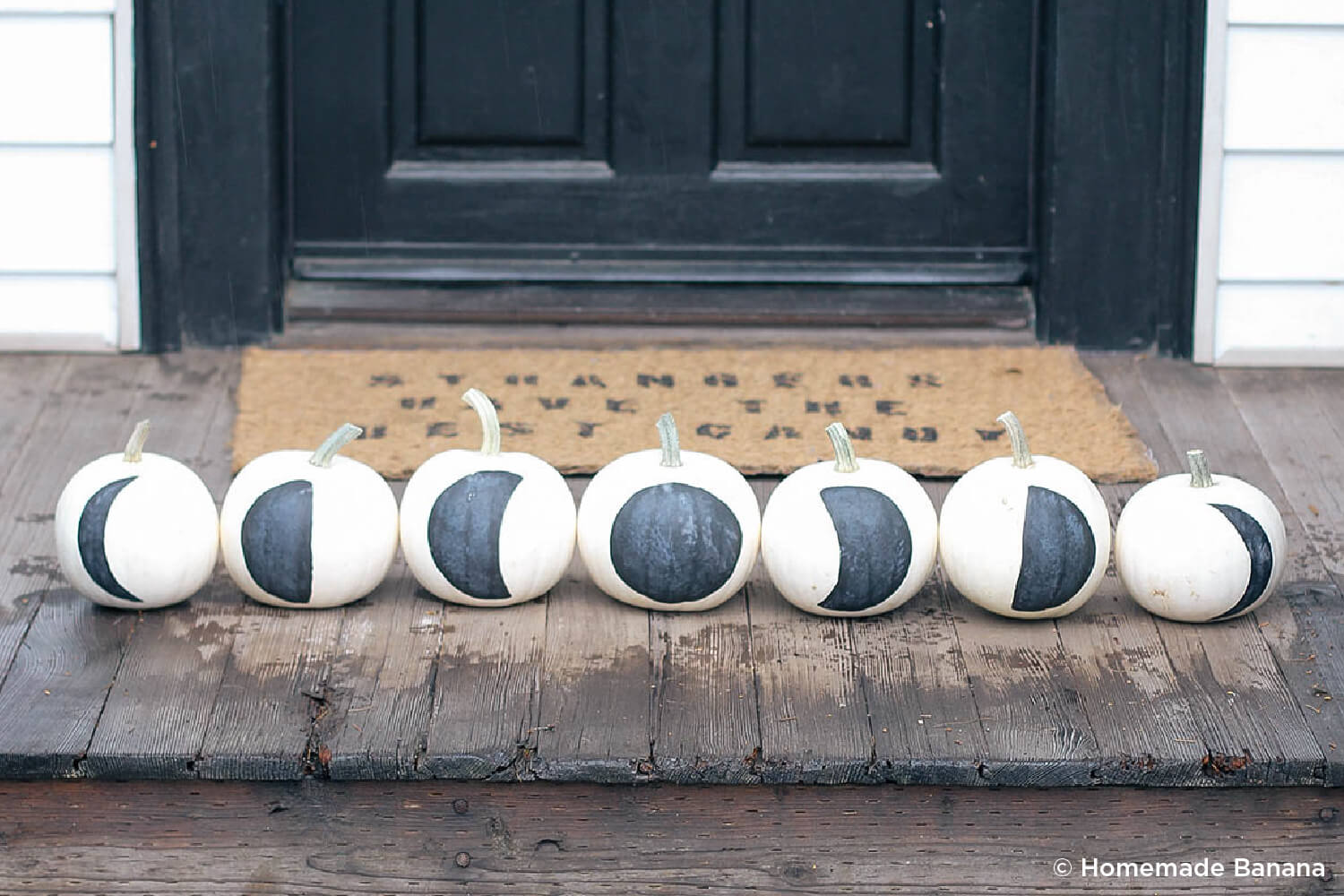pumpkins painted with the phases of the moon