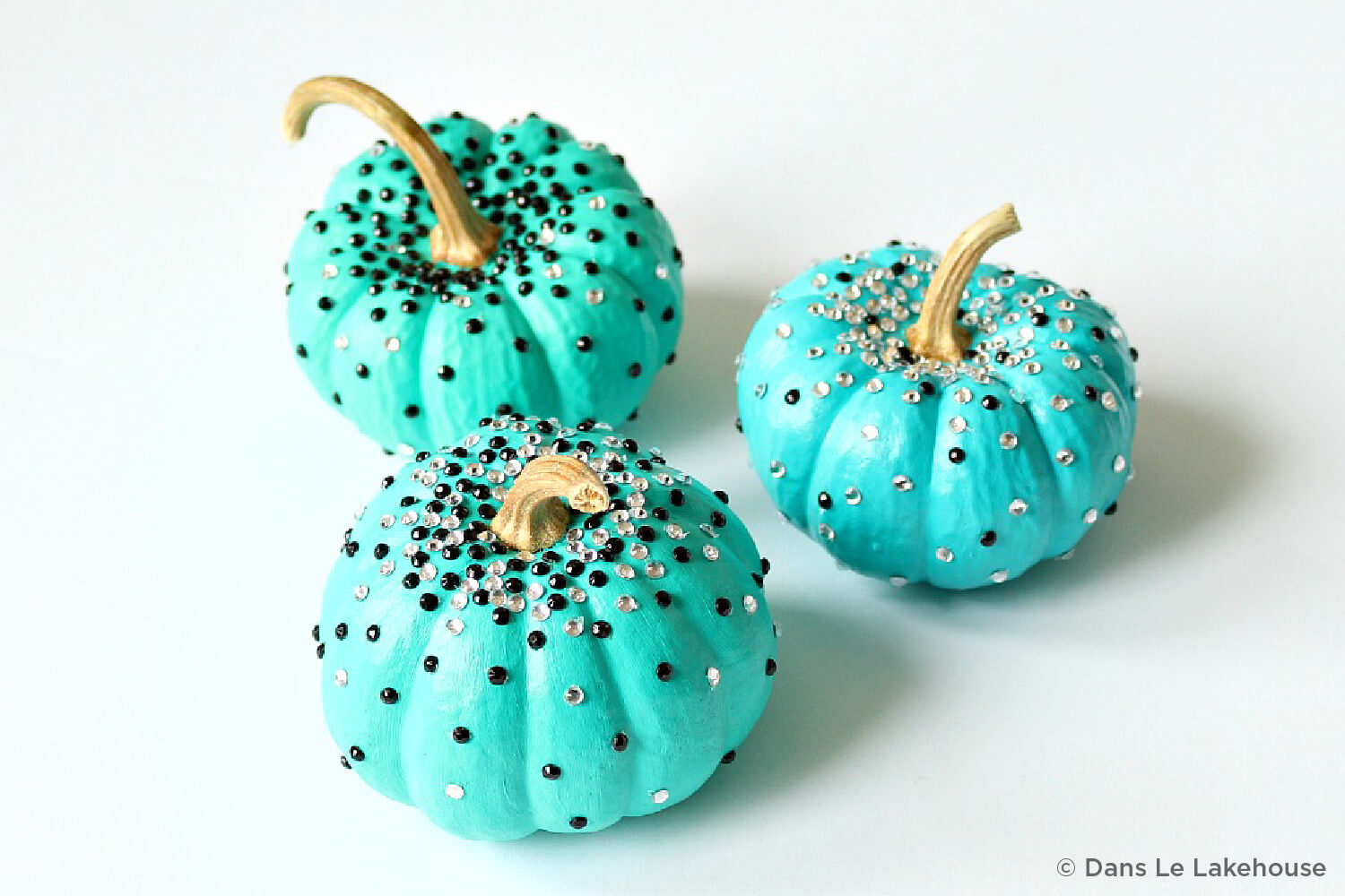 turquoise pumpkins with rhinestones on them