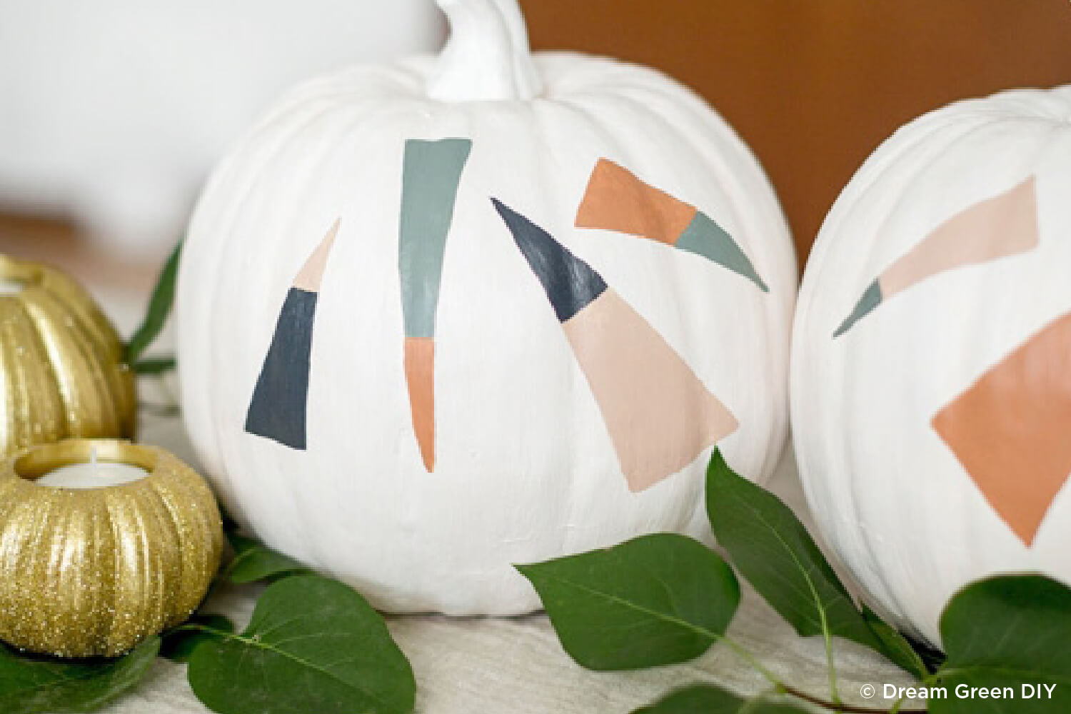 pumpkin painted with two toned triangles