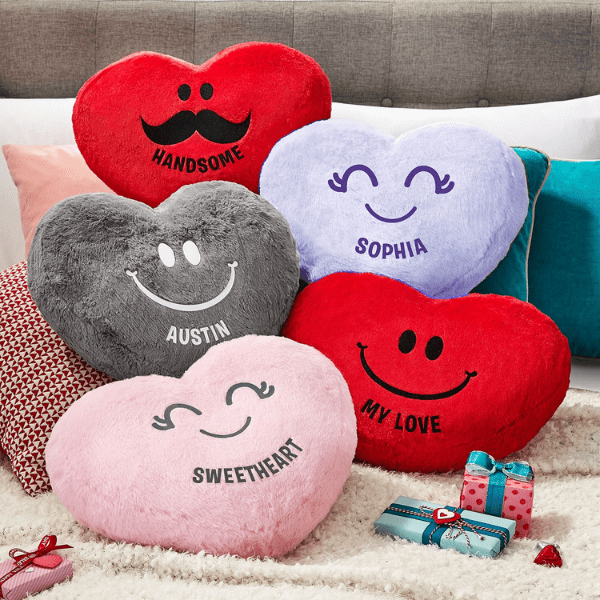 red, grey, pink and purple plush heart pillows