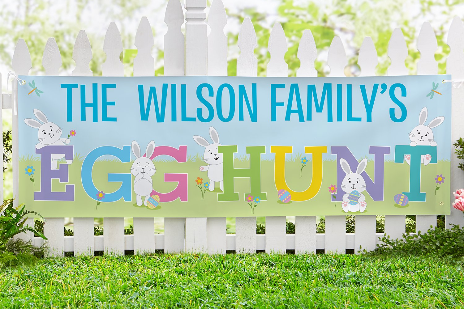 Easter Egg Hunt Banner Hanging on Fence